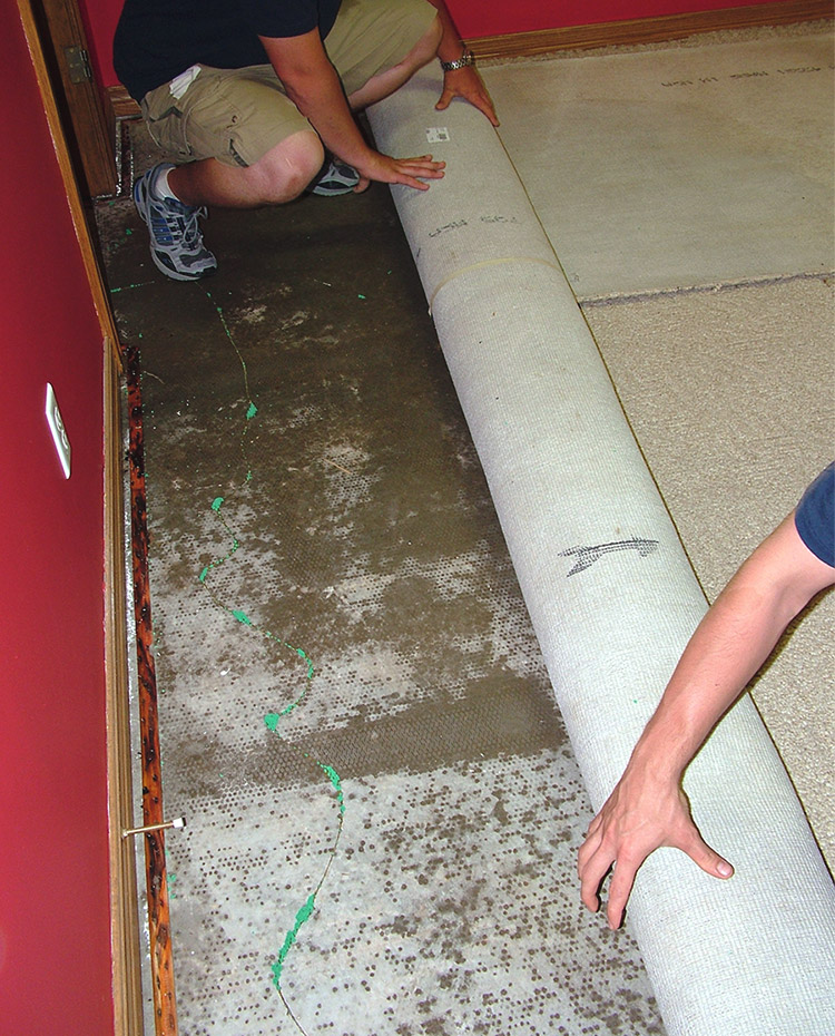 Moisture-related distress on concrete flooring